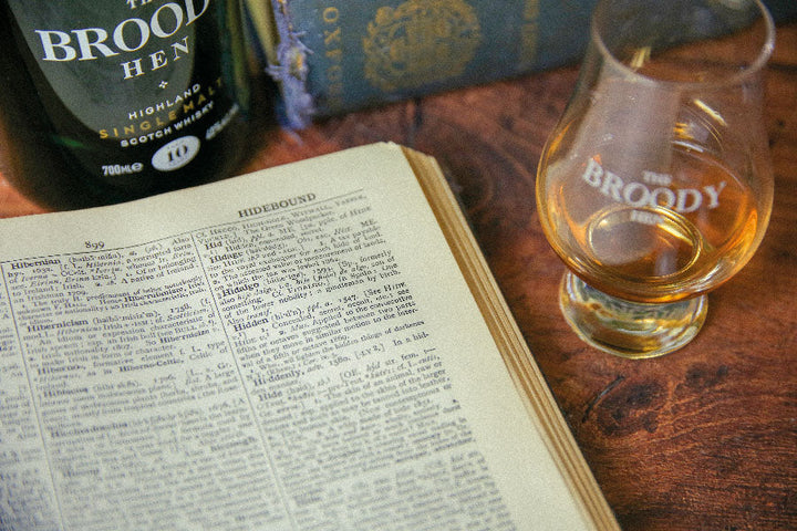 Dram of whisky next to poetry