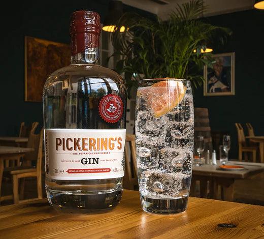 Bottle of Pickering's Gin next to a Gin & Tonic