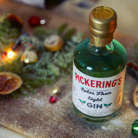 Bottle of Pickering's Later Than Eight Gin in a festive background