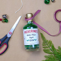 Bottle of Pickering's Later Than Eight with a festive background