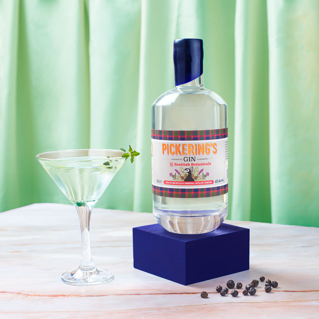 Bottle of Pickering's Gin with Scottish Botanicals next to a martini