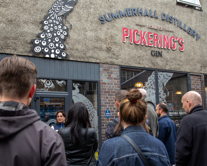 People standing outside of Summerhall Distillery