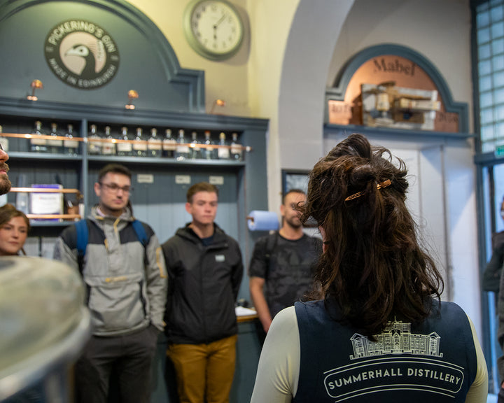 Tour guide giving a tour in Summerhall Distillery