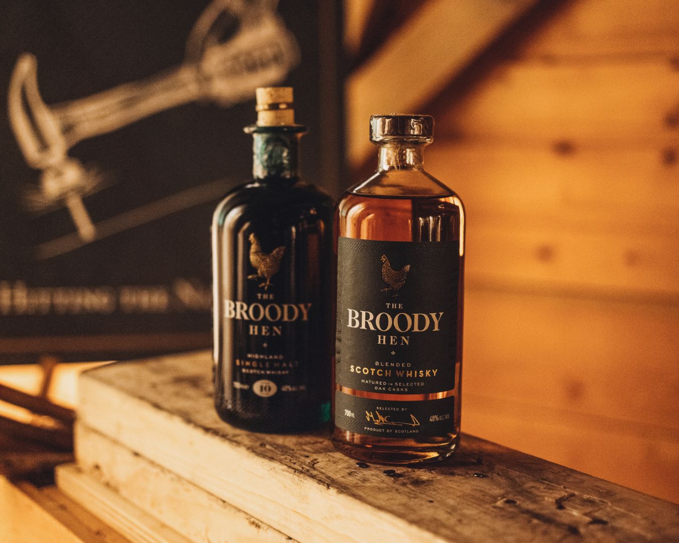 Two bottles of The Broody Hen sat on a shelf
