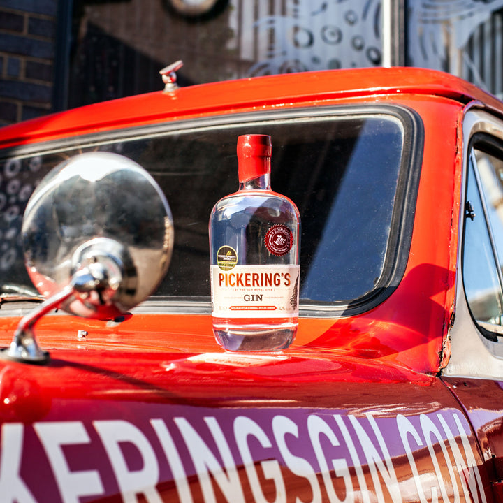 Pickering's Gin bottle on top of branded Pickering's Gin Van